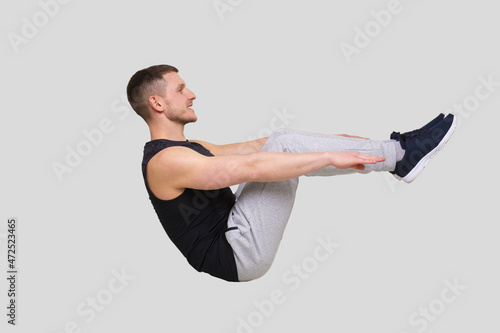 Fototapeta Naklejka Na Ścianę i Meble -  Sport Man Doing ABS Excersice Isolated. Sportsman Workout. Plank