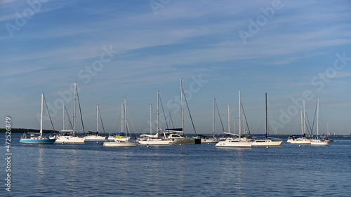 Sailboats at anchor off Crandon Park and marina on sunny autumn morning. © Francisco