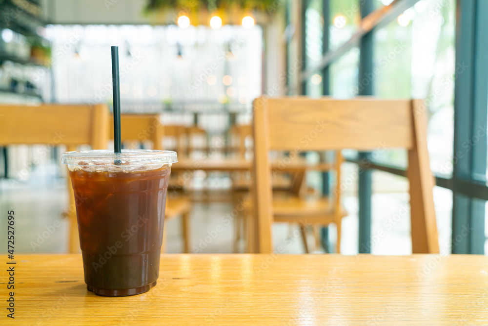 iced black coffee cup on table iced black coffee cup on table