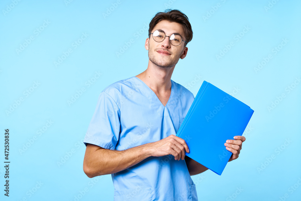 man in medical uniform with glasses patient history isolated background man in medical uniform with glasses patient history isolated background