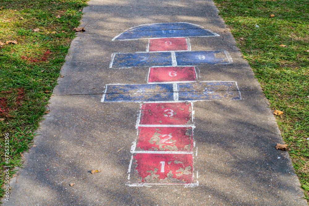 Hopscotch game on the sidewalk in Marsalis Harmony Park in New Orleans, Louisiana, USA