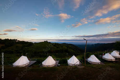    Top beautiful view landscape point from tourist campsite accomodation outdoor with nature of green mountain blue sky background.