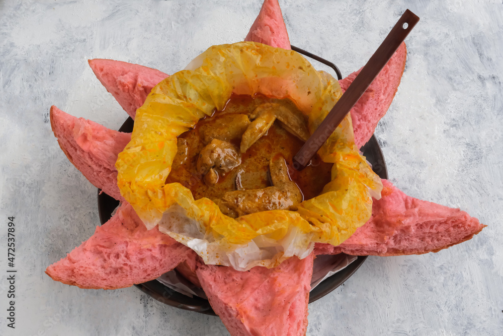 Popular tourist street food. Curry Chicken Dragon Fruit Bread. Spicy