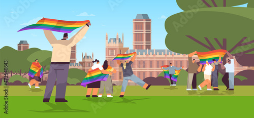 mix race people holding lgbt rainbow flags gay lesbian love parade pride festival transgender love concept