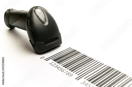 Barcode scanning. Reader laser scanner for warehouse. Retail label barcode scan isolated on white background. Warehouse inventory management. photo