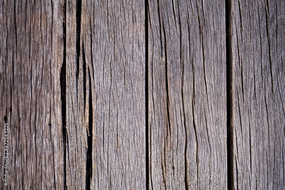 old wooden background with cracks in lines