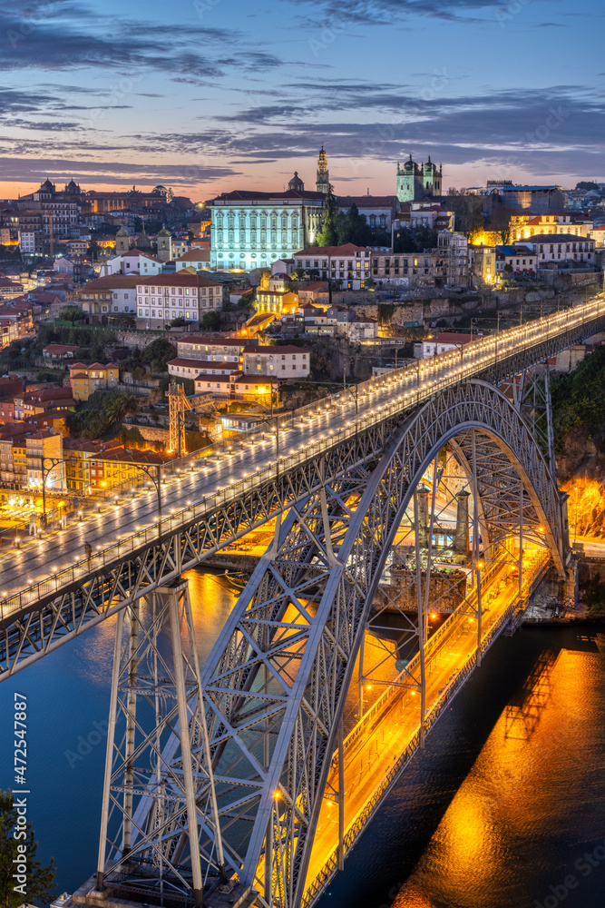 The Dom Luis I bridge and the river Douro in Porto after sunset