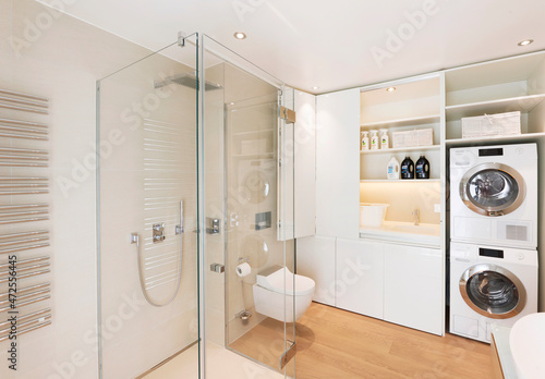 Luminous bathroom with landry place
