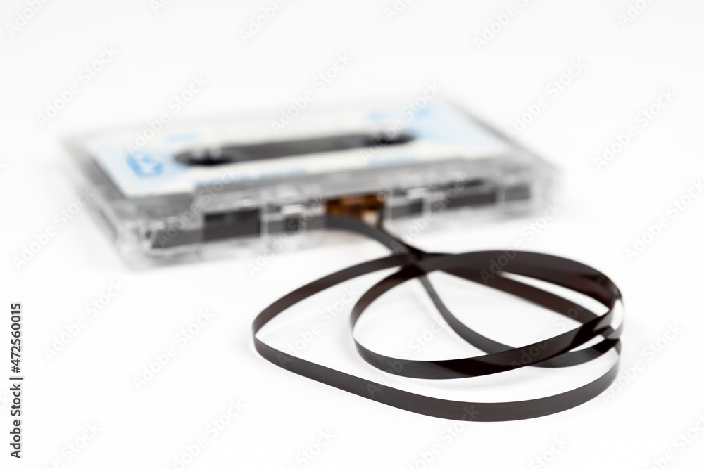 Old audio cassette with loose tape Old audio cassette with loose tape