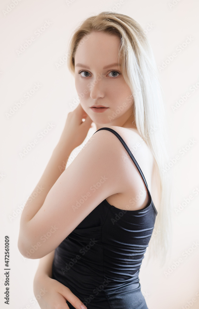 Portrait of a beautiful young woman with blue eyes. Portrait of a beautiful young woman with blue eyes.