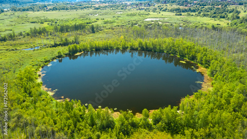 Aerial view of Bottomless Lake in forest of Solnechnogorsk District, Moscow region. Russia. Aerial view. The lake is perfectly round and its depth is not determined.