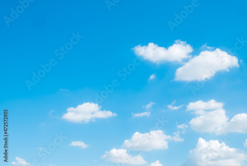 white fluffys clouds sky background with blue sky background for copyspace