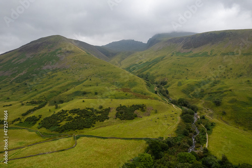 Aerial summer view in cloudy Scafell Pike  Lake District  United Kingdom