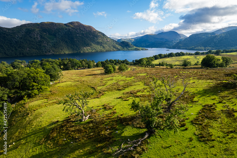 Aerial summer view of sunny surroundings of Ullswater lake, Lake District, United Kingdom