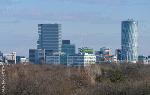 Bucharest, Romania - 2021: The north part of the city with its tallest office buildings, view from above. Sky Tower and Globalworth skyscrapers in background.