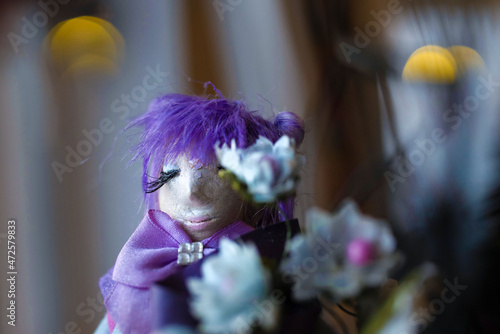 hand crafted doll with purple hair