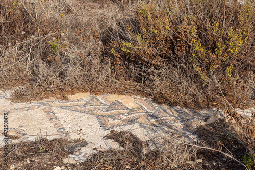 Remains  of an ancient mosaic of a 6th-century Orthodox church at Tel Shikmona, on the shores of the Mediterranean Sea, near Haifa city, on north of Israel photo