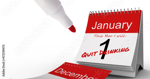 Image of red pen and quit drinking text in red on january 1st of daily calendar