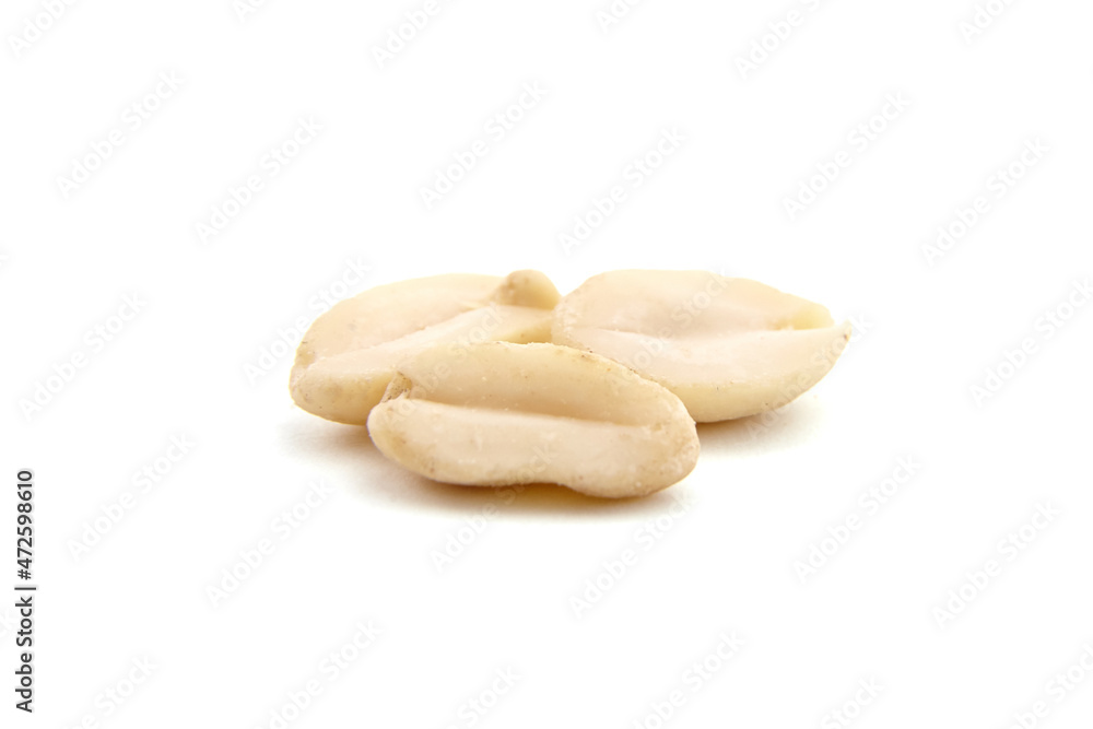 Raw blanched peanuts isolated on white Raw blanched peanuts isolated on white
