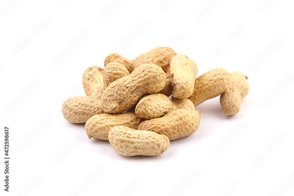 Roasted peanuts in shell isolated on white Roasted peanuts in shell isolated on white