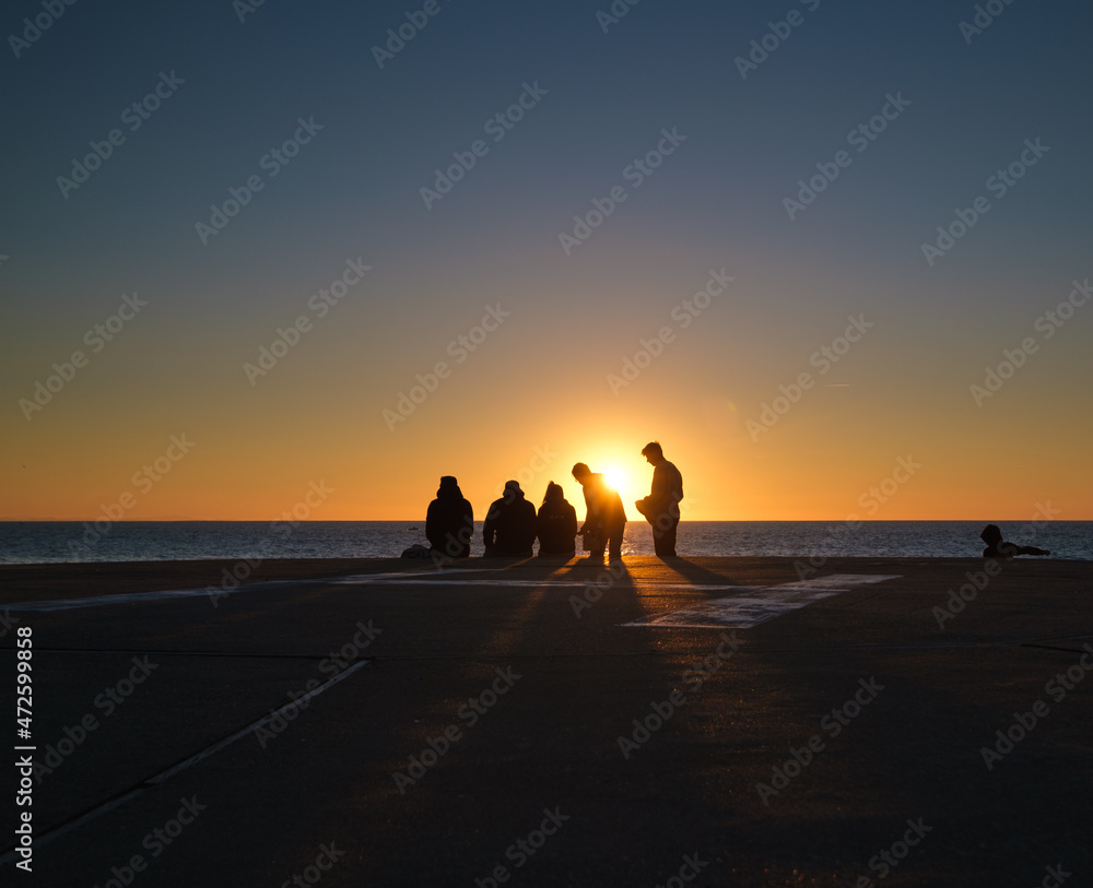 sunset beach people 