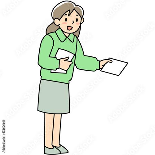 ちらしを渡す若い女性
