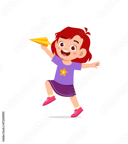 cute little girl play paper plane and feel happy