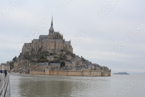 Mont-saint-michel historic fortress town with cathedral on a rock island in autumn in Normandy, France