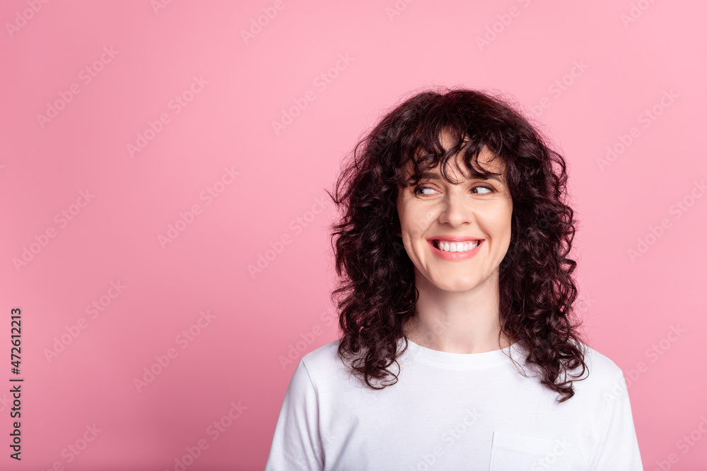 Photo of young cheerful lady guess wondering look empty space clever isolated over pink color background Photo of young cheerful lady guess wondering look empty space clever isolated over pink color background