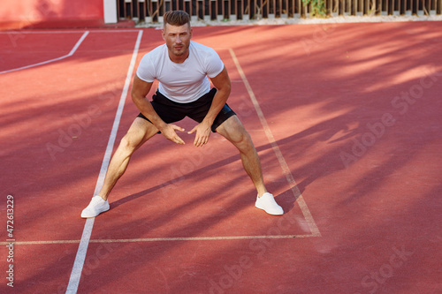 man on the sports ground exercise warm-up lifestyle