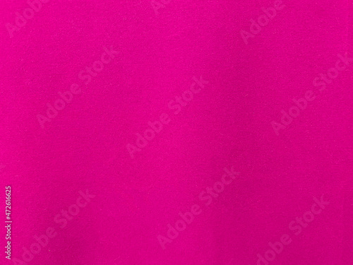 Pink velvet fabric texture used as background. Empty pink fabric background of soft and smooth textile material. There is space for text.. © Sittipol 