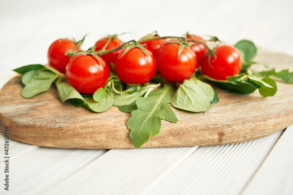 cherry tomatoes lettuce leaves wooden board fresh food cherry tomatoes lettuce leaves wooden board fresh food