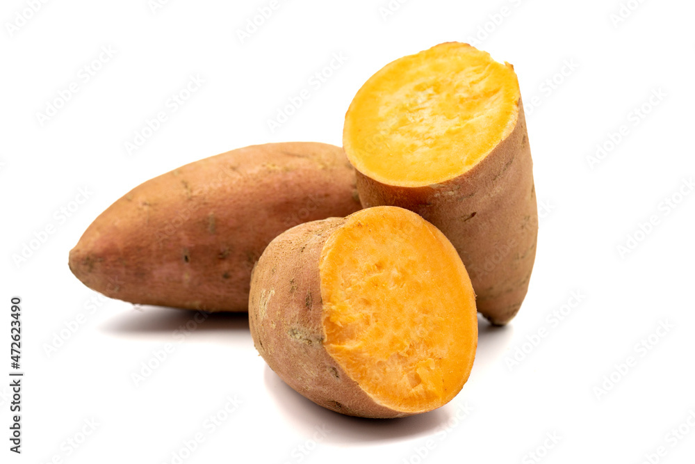 sweet potatoes on a white background. cut sweet potatoes. horizontal view. close up sweet potatoes on a white background. cut sweet potatoes. horizontal view. close up