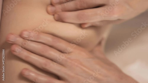 Wallpaper Mural Massage session: woman receiving back massage from professional masseur. Attractive caucasian woman having relaxing massage on the back in spa salon. Healthy lifestyle and body care concept Torontodigital.ca