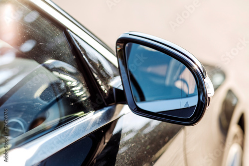 Right external mirror of the car close up