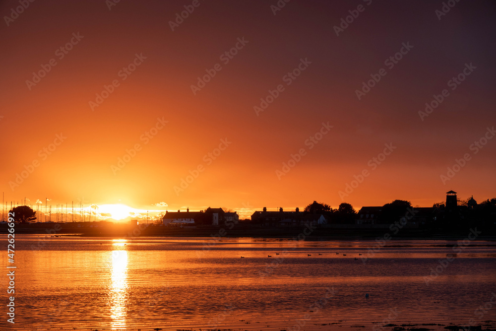 Sunset over Langstone Harbour and Mill Hampshire England
