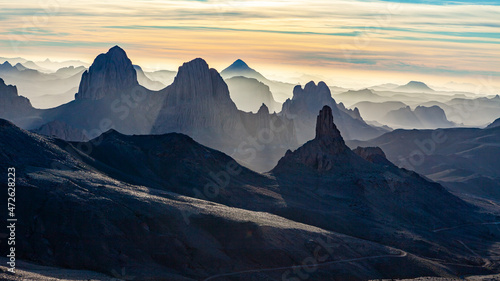 Ahaggar mountains in the sahara desert of algeria at sunrise photo