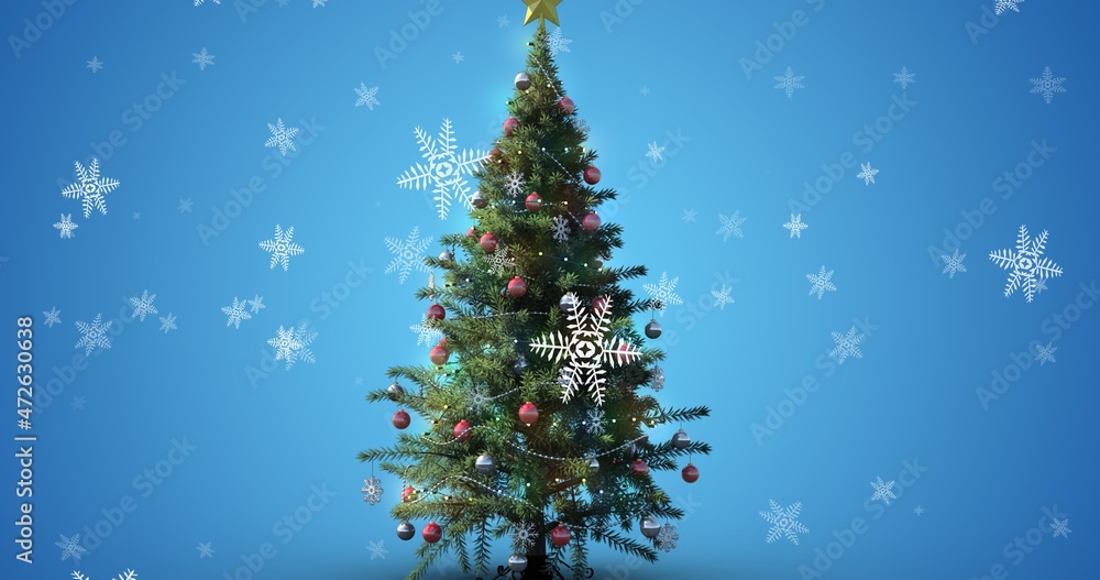 Digital composite image of christmas tree and snowflakes against blue background with copy space Digital composite image of christmas tree and snowflakes against blue background with copy space