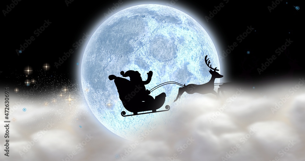 Fototapeta premium Composite image of silhouette santa sleigh against full moon at night with copy space