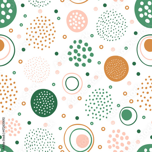 Abstract geometric seamless pattern with colorful circles and dots.