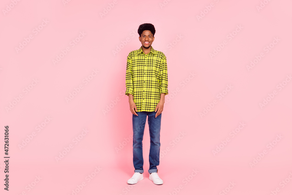 Fototapeta premium Full body photo of happy charming cheerful afro american man good mood isolated on pink color background