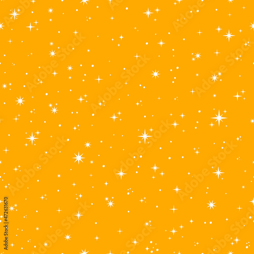 Yellow seamless pattern with tiny stars.