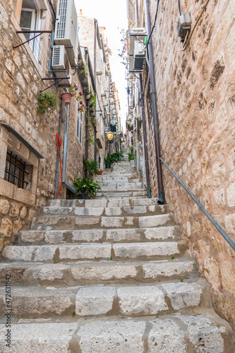 Narrow street with stairs at old city of Dubrovnik, Croatia.