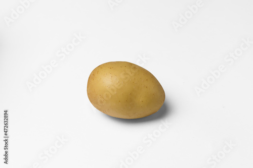 ripe potato isolated on white