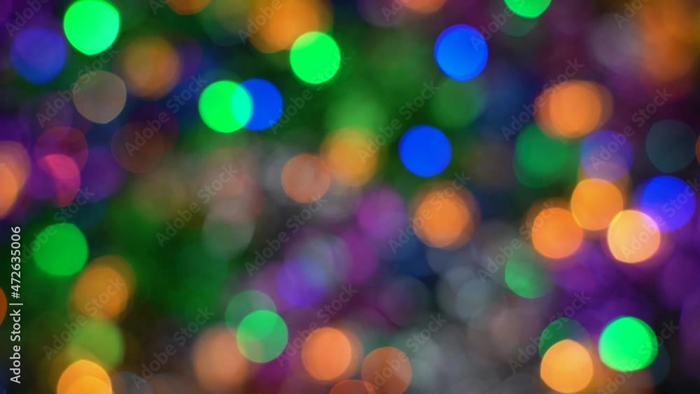 Defocused Xmas lights festive decorations, abstract blurry bokeh background effect. Holiday concept backdrop, twinkling bright shapes. Out of focus glowing celebration texture for use graphic design. Defocused Xmas lights festive decorations, abstract blurry bokeh background effect. Holiday concept backdrop, twinkling bright shapes. Out of focus glowing celebration texture for use graphic design.
