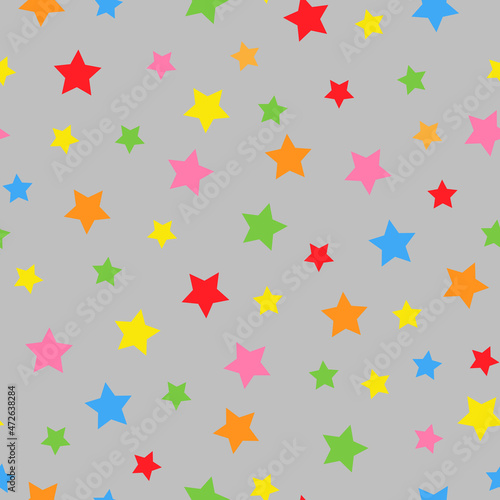 A simple star pattern. Grey background  colored stars. The print is well suited for Wallpaper textiles  banners and packaging.