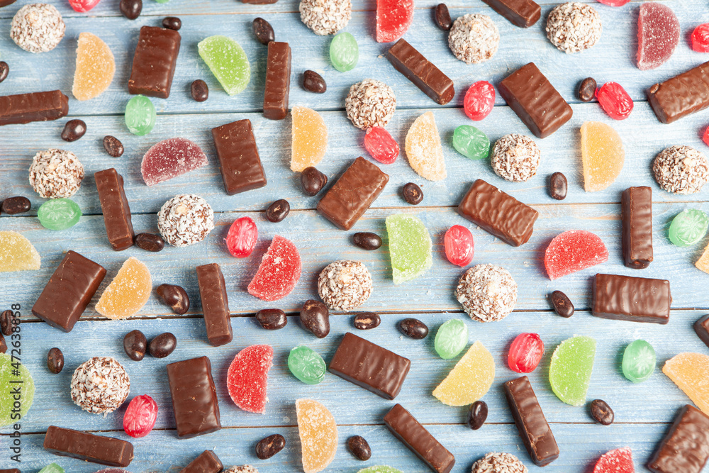 New Year's Eve table full of chocolates for children. Chocolate candy isolated 