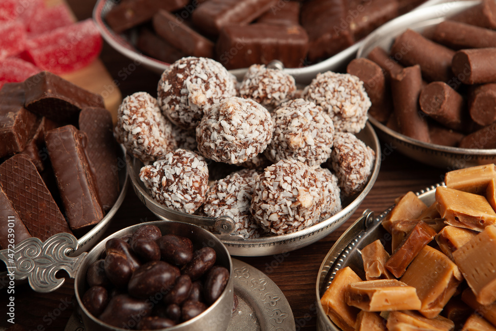Assortment of delicious chocolate candies background. Chocolate candy isolated Assortment of delicious chocolate candies background. Chocolate candy isolated