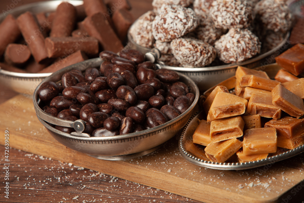 Assortment of delicious chocolate candies background. Chocolate candy isolated Assortment of delicious chocolate candies background. Chocolate candy isolated