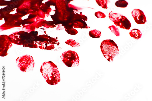 Red Bloody fingerprints on the white background. Horror and crime scene concept. Halloween postcard.